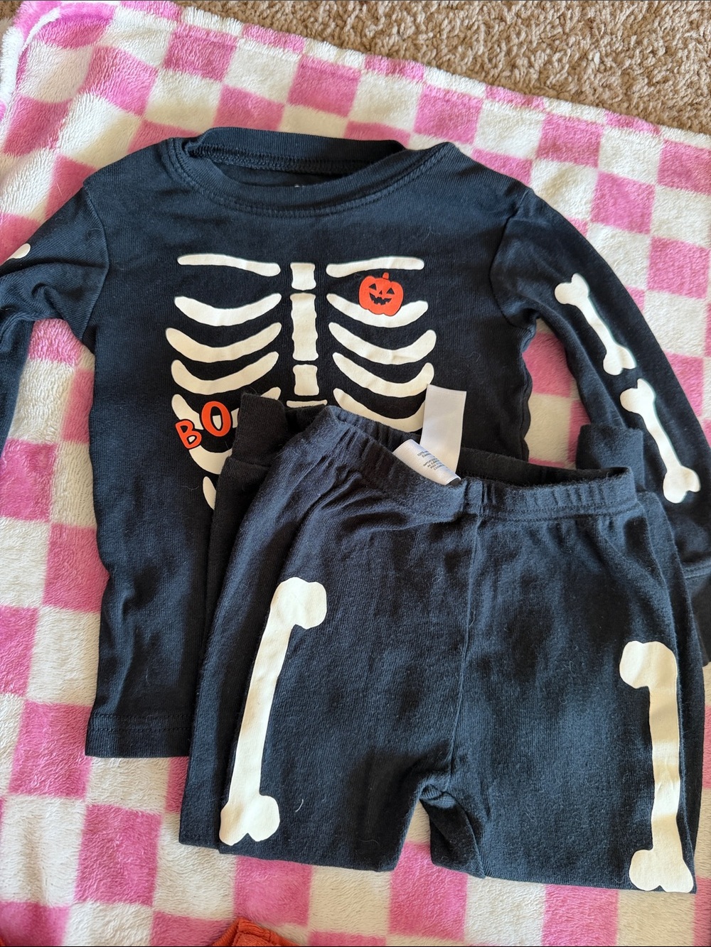 Kids Black Skeleton Halloween Pajama Set with Pumpkin Accent